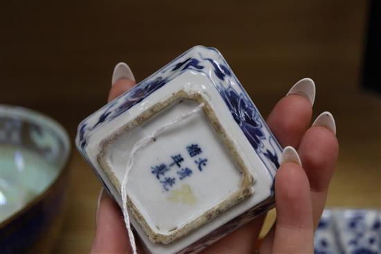 A pair of Chinese blue and white square dishes, Guangxu mark and period, hardwood stand